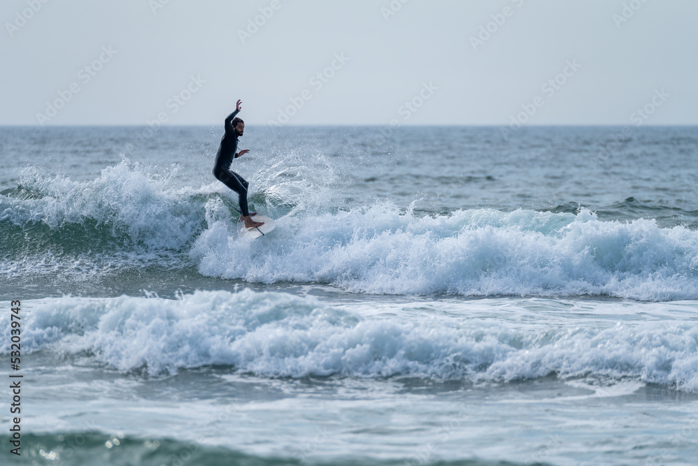 Surfer riding a wave