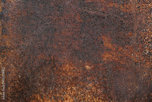 Dark light red rusty metal plate. Grunge texture. Rusty metal background. Rusty orange texture. Rust.