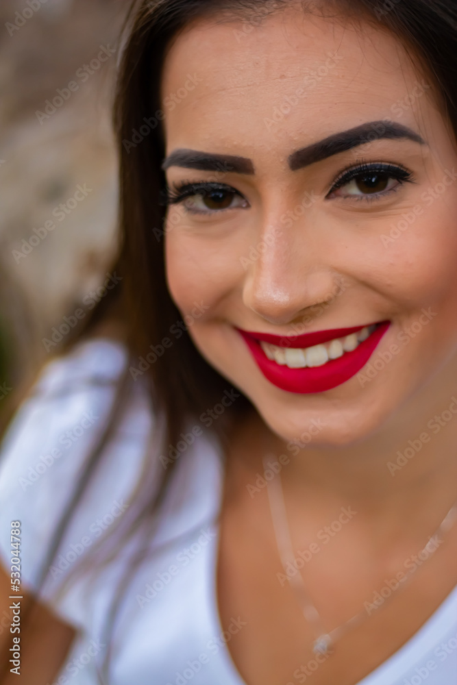 Beautiful brunette girl in a park Beautiful brunette girl in a park