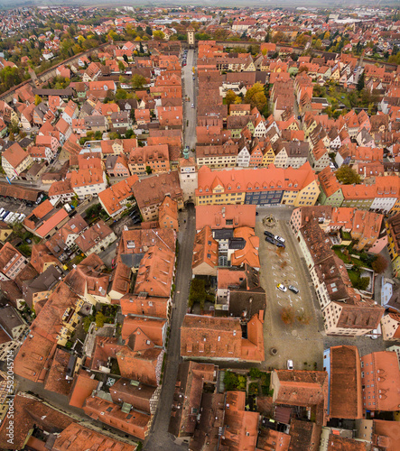 Aerial view of the old town of the city Rothenburg ob der Tauber in Germany on early foggy morning in Autumn. 