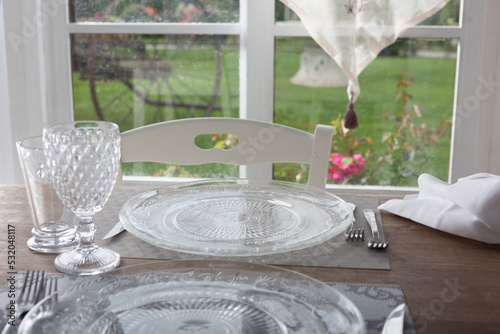 lunch set table in a bay window