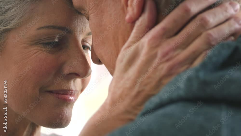 Love, forgive and elderly couple hug and bonding in home together, sharing affection and a sweet moment. Sorry, care and romance by mature man and woman embracing and being loving closeup of console Love, forgive and elderly couple hug and bonding in home together, sharing affection and a sweet moment. Sorry, care and romance by mature man and woman embracing and being loving closeup of console
