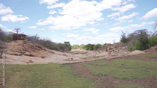 Dry river in an arid land in Makueni County in Kenya -  East Africa photo