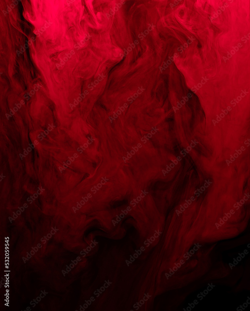 swirling clouds of red smoke randomly mix on a black background