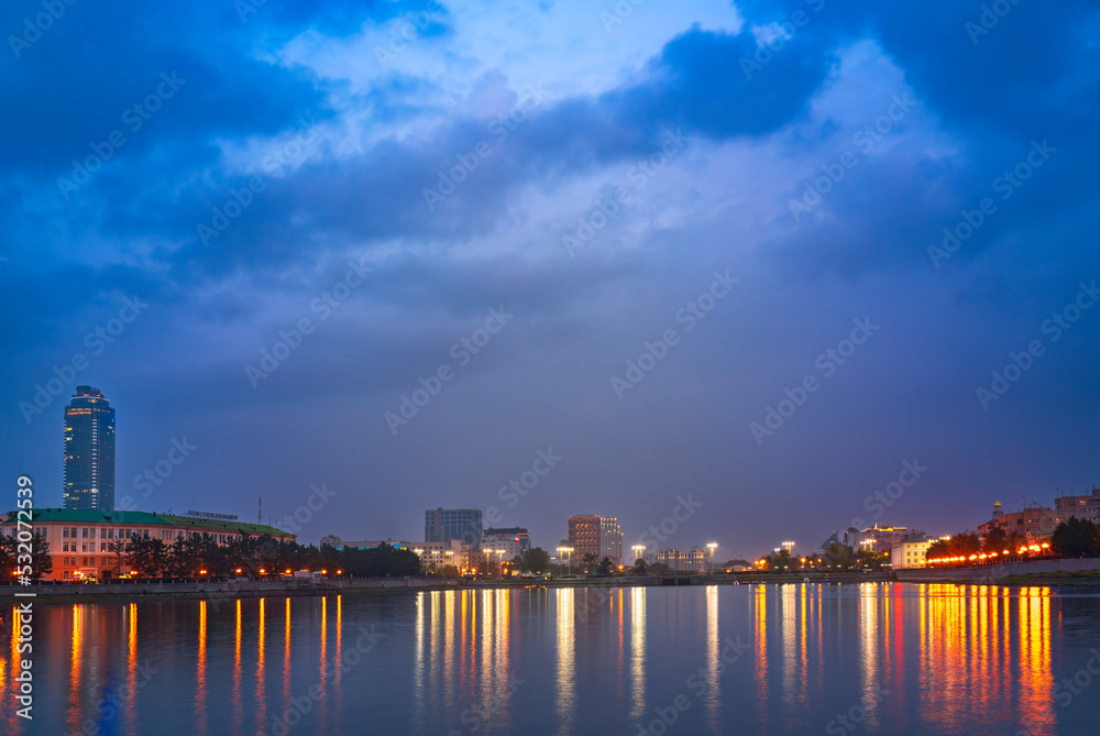 Night on a pond in the center of the city