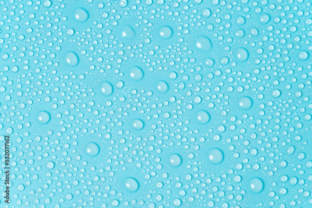 water drops on a blue background close-up