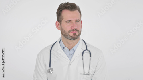 Middle Aged Doctor Showing No Sign by Head Shake, White Background