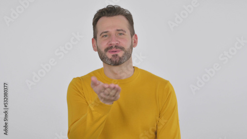 Middle Aged Man Giving Flying Kiss by Hands , White Background