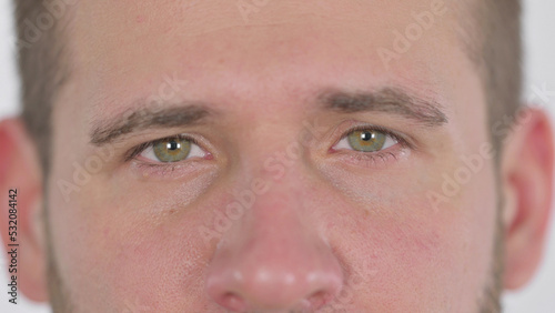 Close up of Blinking Eyes of Middle Aged Man