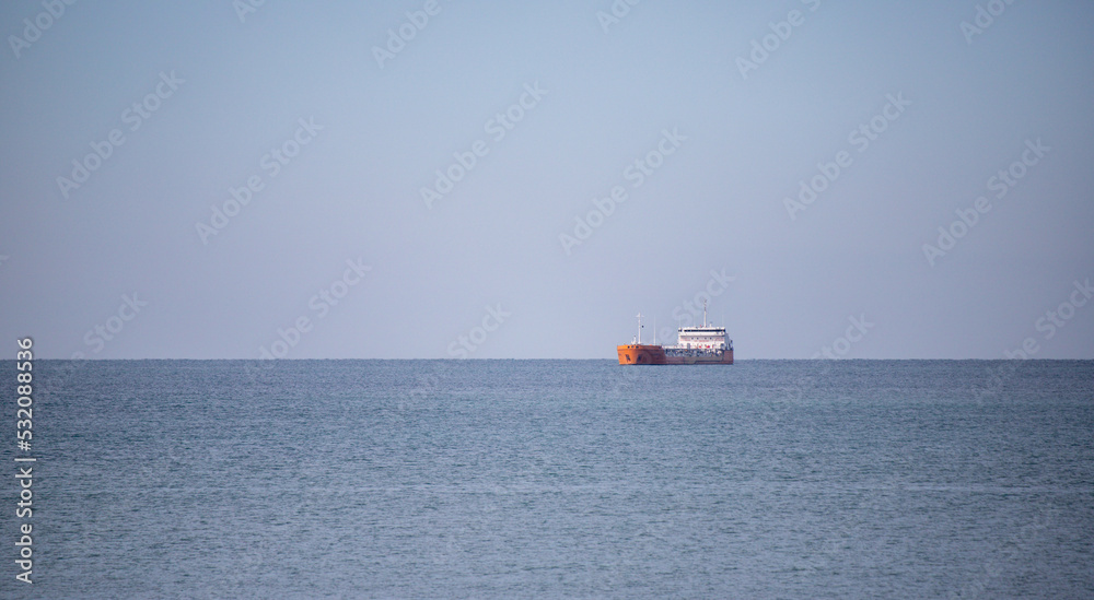 Istanbul, Turkey - 09/19/2022: Side view of a cargo ocean liner in the Black Sea. Tanker for transportation of oil, gas, industrial zone import export.