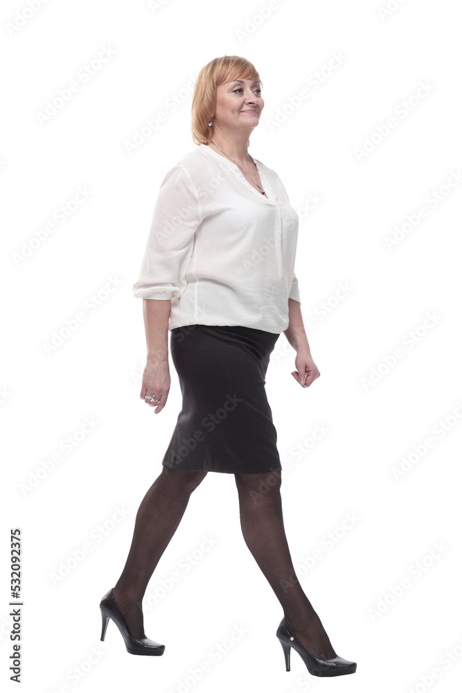 Fototapeta premium in full growth. smiling business woman striding forward .