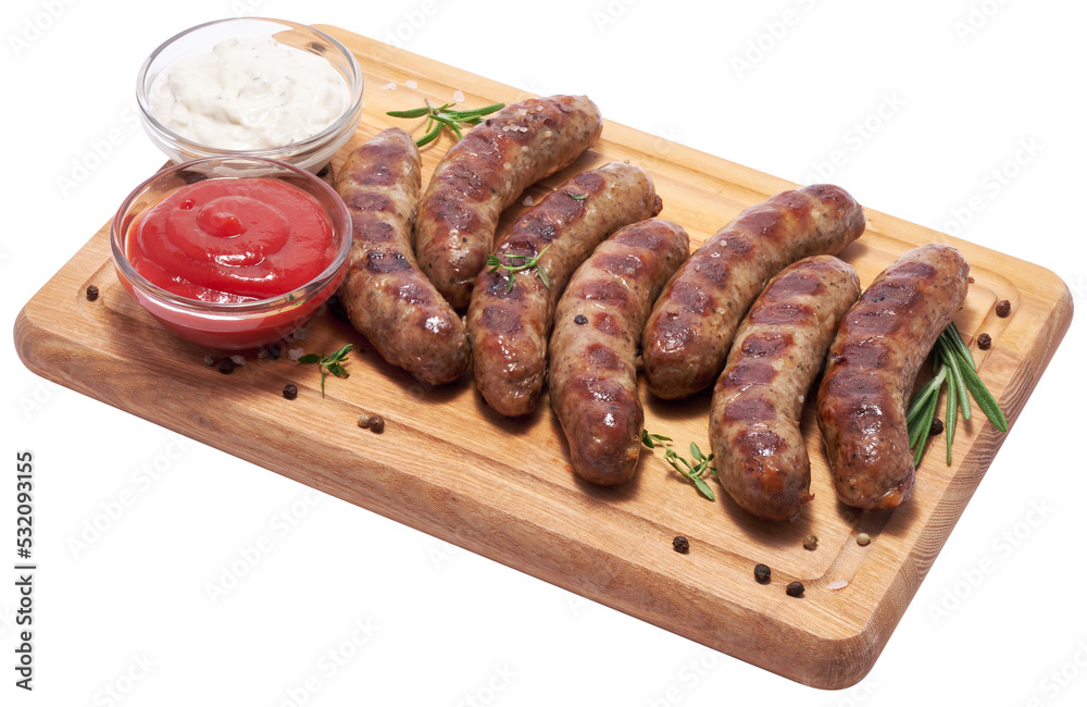 Grilled sausages on wooden cutting board Grilled sausages on wooden cutting board