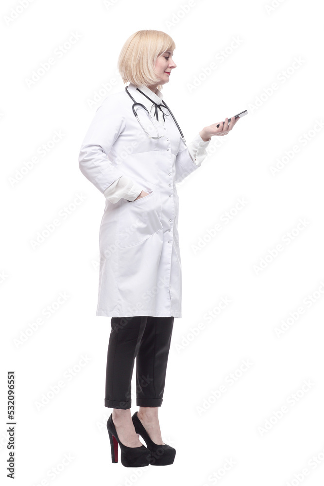 qualified female doctor with a smartphone in her hands. qualified female doctor with a smartphone in her hands.