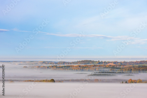 Beautiful landscape view with morning fog in autumn © Lars Johansson