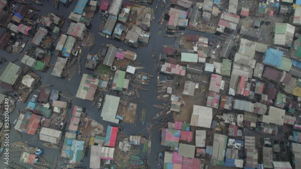 Houses built on a slum with canoes around them in Lagos Nigeria Stock