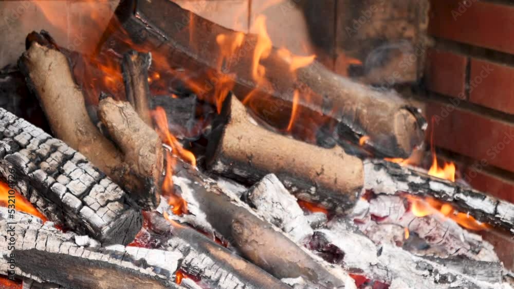 Natural wood charcoal grill with fire Natural wood charcoal grill with fire
