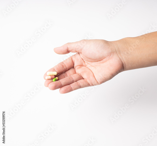 Hand holes medical pill white background