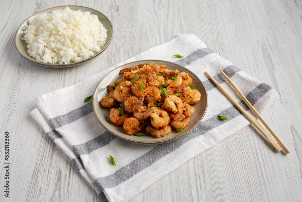 Homemade Crispy Salt and Pepper Shrimp with White Rice, side view. Homemade Crispy Salt and Pepper Shrimp with White Rice, side view.