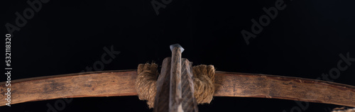 Canvas Print ancient crossbow isolated on black background