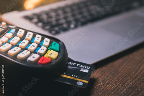 close-up Hands of business women are using credit cards for digital payments, e-commerce is the current shopping lifestyle on the Internet so it is important but beware of online transaction crimes.