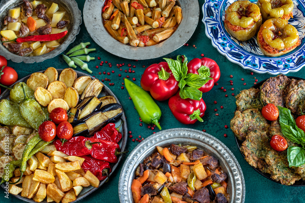 Many meals in the plates like kızartma , fritter and dolma with top view 