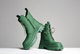 Trendy shoes. fashion still life. stylish green boots