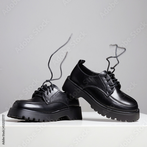 Black leather boots. fashion shoes still life