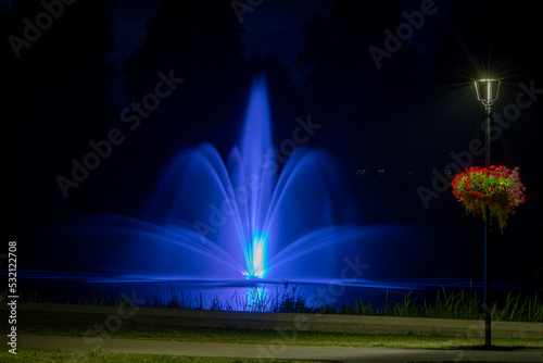 Beautiful illuminated colorful fountain in Smiltene  Latvia