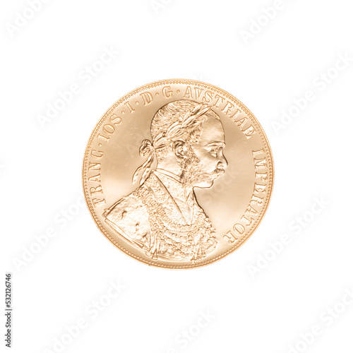 four austrian ducats on a white background. investing in gold bullion coins
