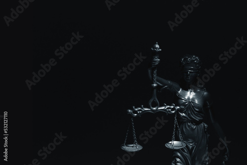 Silhouette of Lady Justice with scales of truth. Conceptual image of justice, law and legal system. Copy space for text.