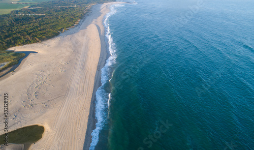 aerial view of a beach at sunrise at dawn
