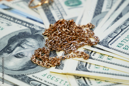 many golden jewerly and money, pawnshop concept, jewerly shop concept
