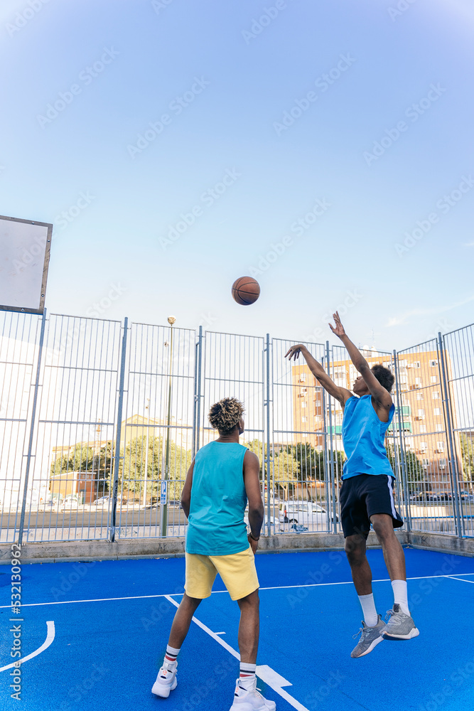 African Friends Playing Basketball