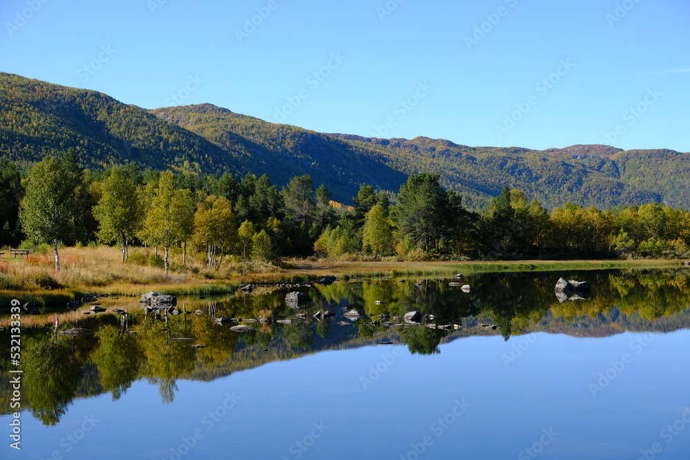 Lake, trees and mountains in Autumn, Geilo, Norway