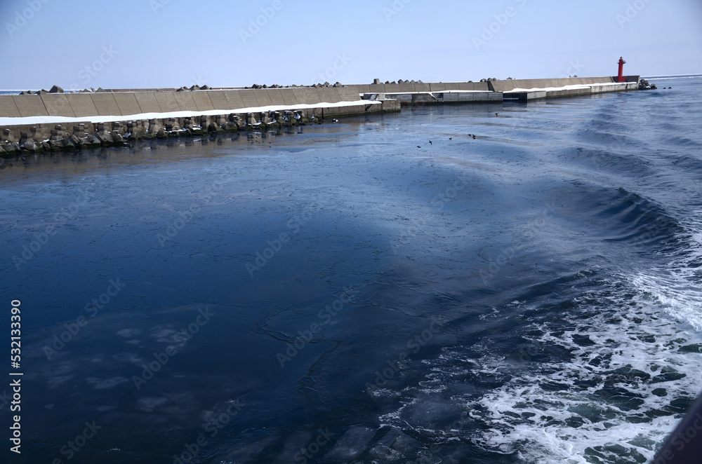 the snow-covered breakwater from Abashiri Port