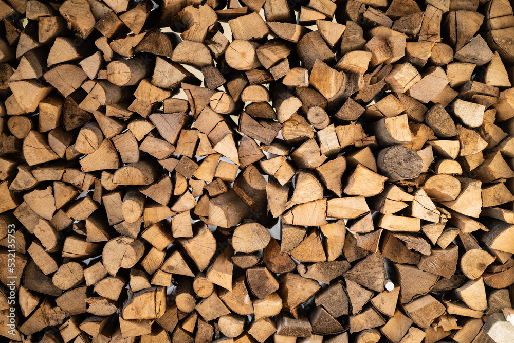 beautifully stacked firewood, natural wood for burning in the furnace beautifully stacked firewood, natural wood for burning in the furnace