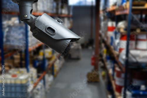 CCTV system security in warehouse of factory chemical blur background. © Oleksandr
