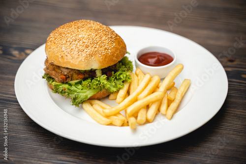 delicious dish of burger and french fries in a restaurant