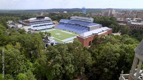 aerial past the moorehead patterson bell tower towards kenan memorial stadium on the unc chapel hill campus in chapel hill nc, north carolina photo