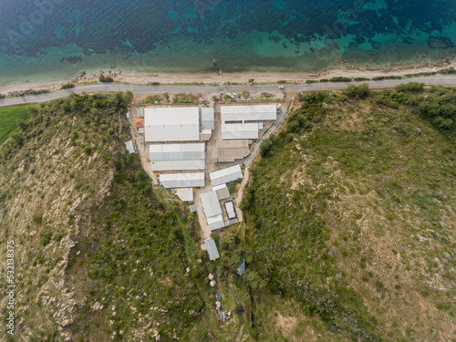 Aerial view of an infrastucture at seaside. Climate change concept © ern