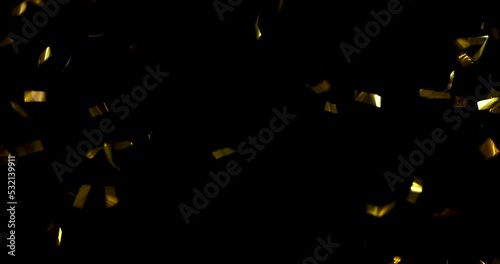 Falling foil confetti with gold glitter on a black background.