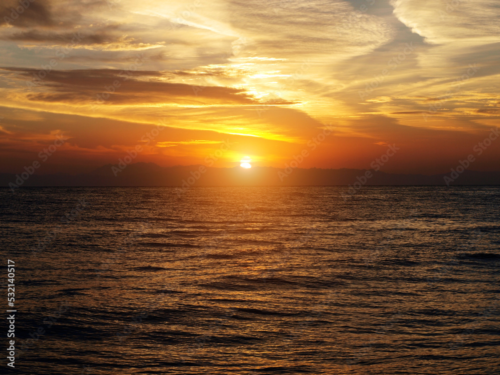 Sunset seascape. Calm ocean view. tranquil and peaceful water