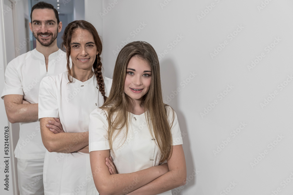 Portrait of confident happy group of doctors standing at the medical office Portrait of confident happy group of doctors standing at the medical office