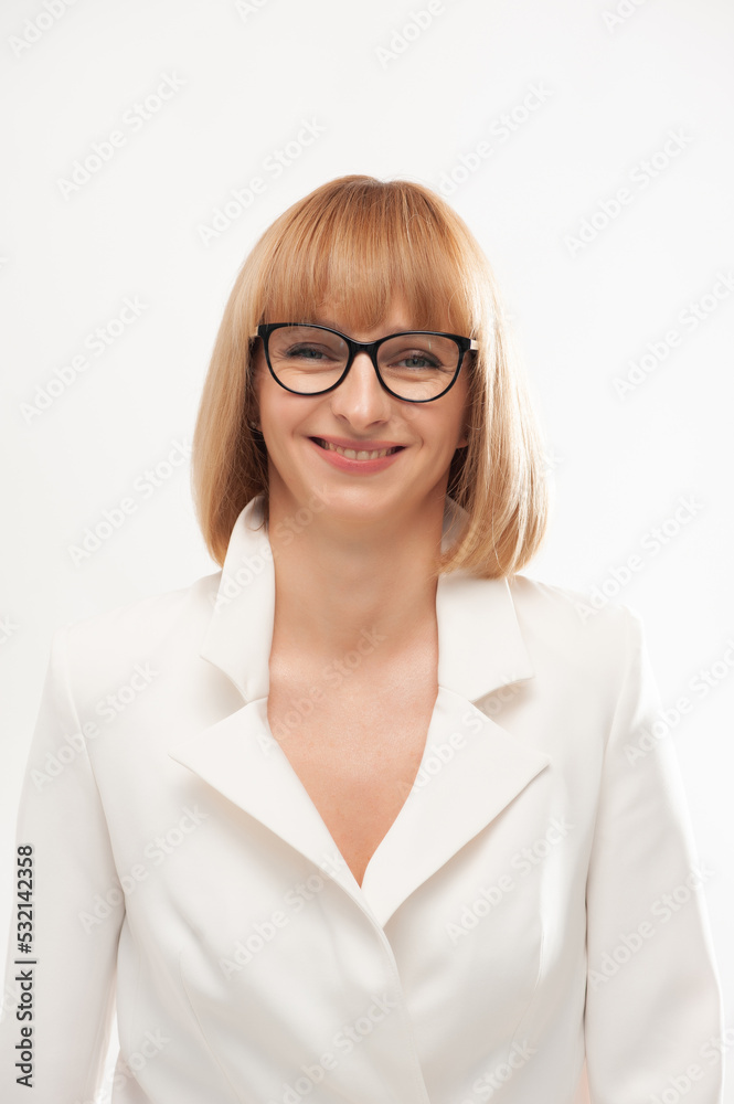 Confident businesswoman in white formal suit on background Confident businesswoman in white formal suit on background