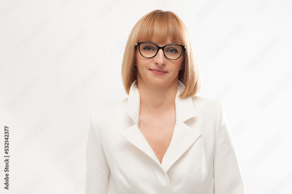 Confident businesswoman in white formal suit on background