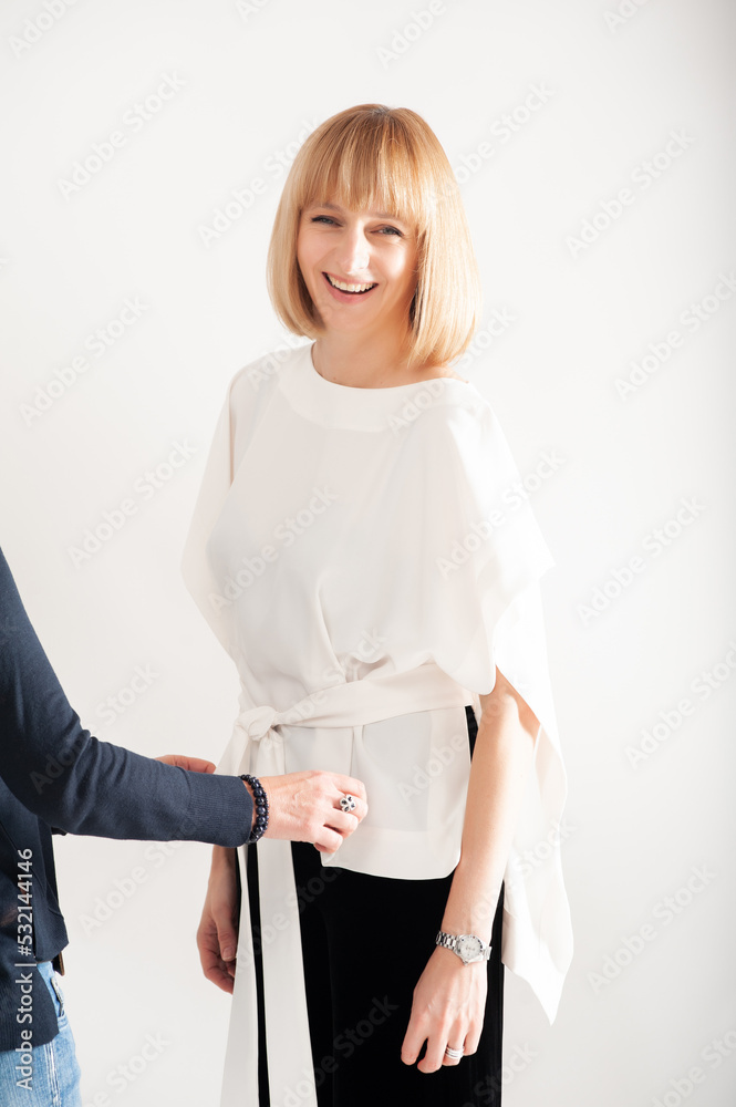 Beautiful blonde businesswoman portrait on background Beautiful blonde businesswoman portrait on background