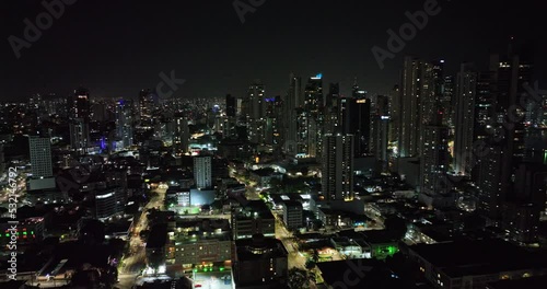 Wallpaper Mural Panama City Aerial v62 flyover calidonia neighborhood, panning up capturing illuminated modern downtown cityscape with waterfront high rise buildings at night - Shot with Mavic 3 Cine - March 2022 Torontodigital.ca