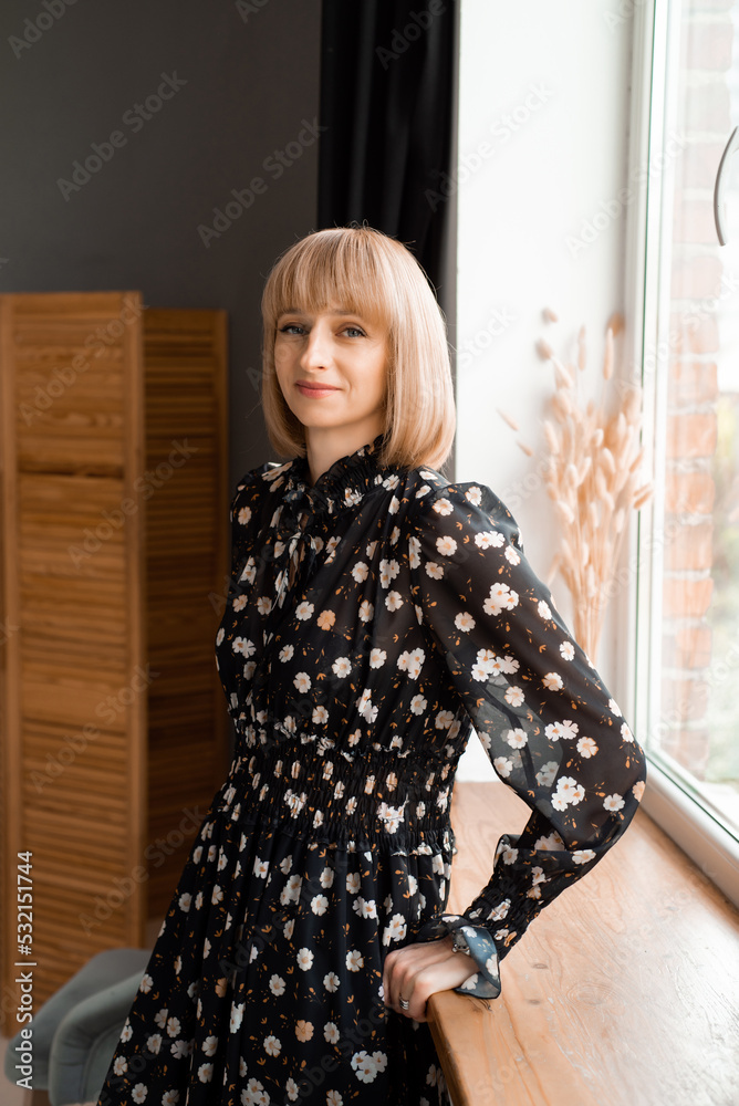Confident woman in black dress on background Confident woman in black dress on background