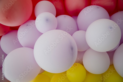 colorful ornamental party balloons tied together