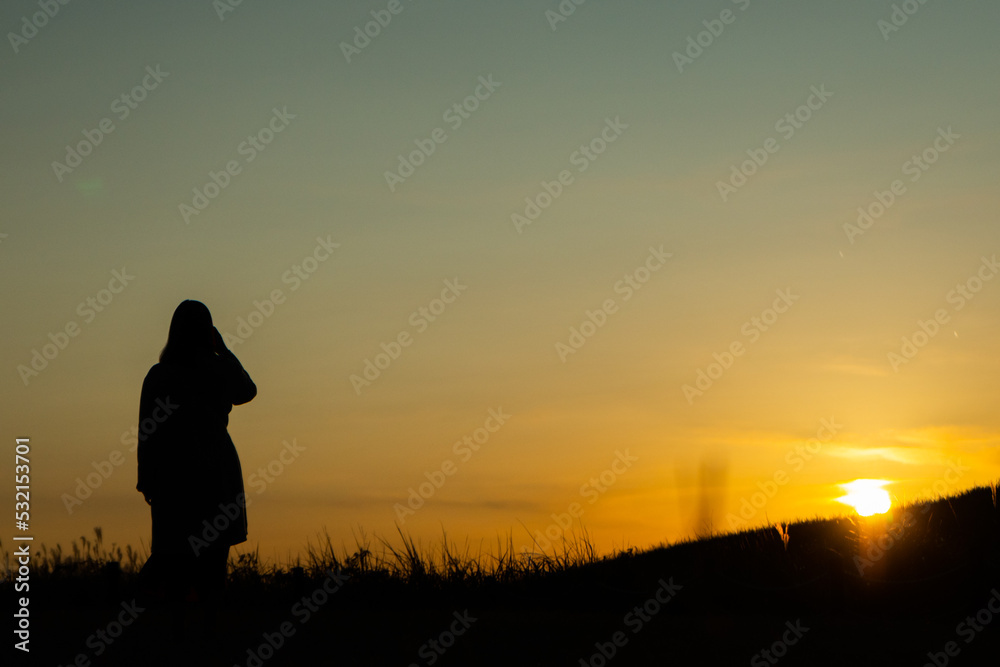 Fototapeta premium sunset with a girl